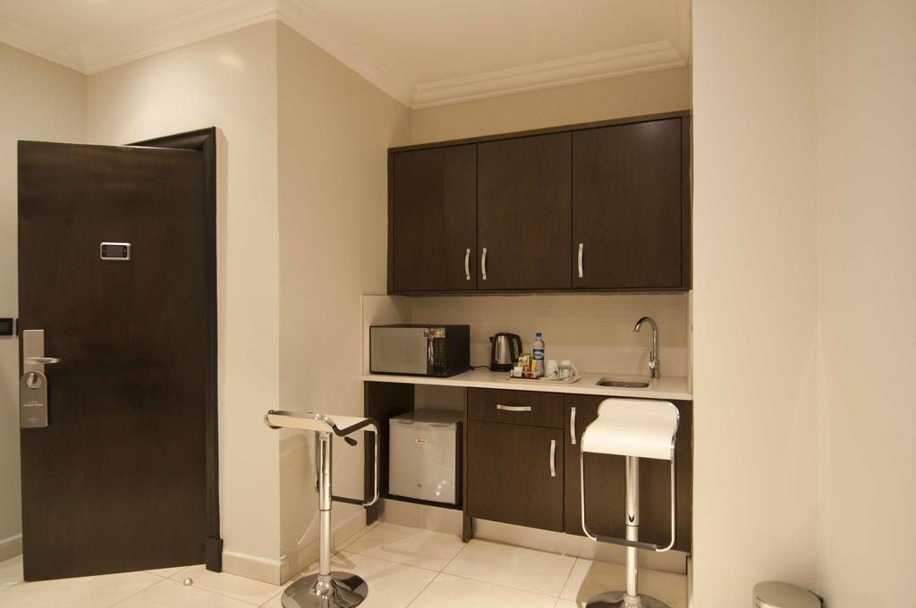 L'Eola Suites Abuja Quarto foto